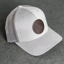 Leather Patch Performance Style Trucker Hat - Wolf Stamp