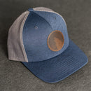 Leather Patch Performance Style Trucker Hat - Wolf Stamp