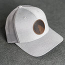 Leather Patch Performance Style Trucker Hat - Wolf Stamp