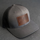 Leather Patch Trucker Style Hat - New York Stamp