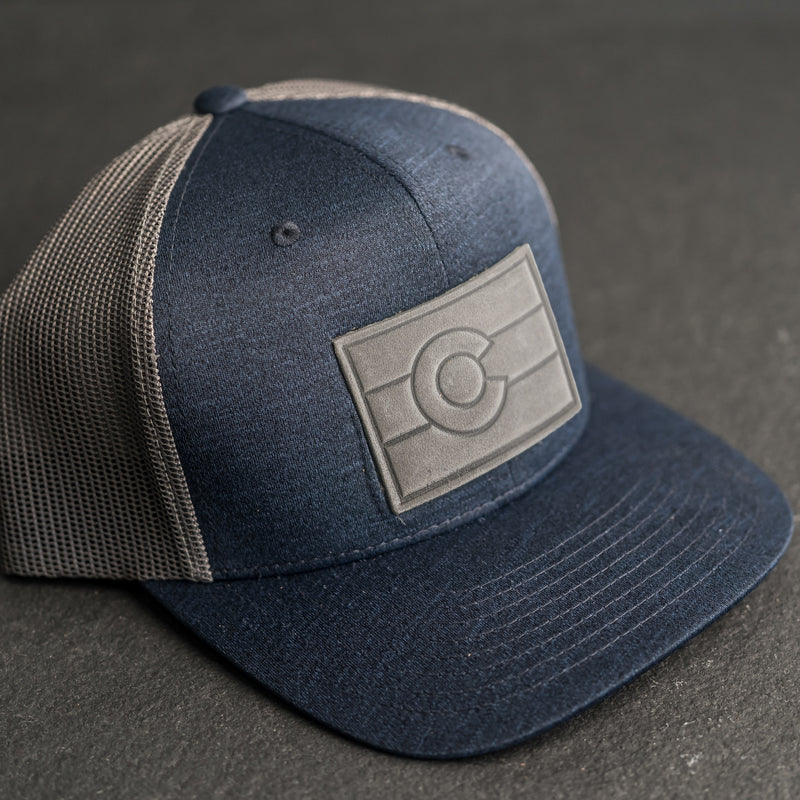 Leather Patch Performance Style Trucker Hat - Colorado Flag Stamp