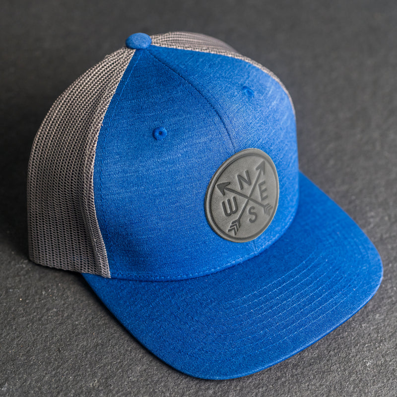 Leather Patch Performance Style Trucker Hat - Compass Rose Stamp