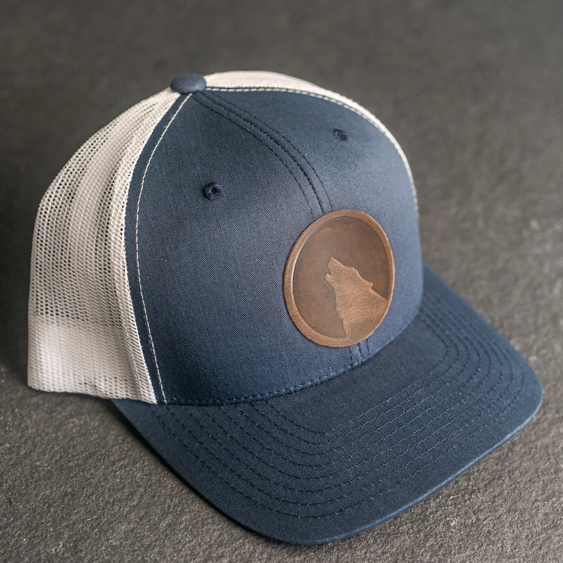 Leather Patch Trucker Style Hat - Wolf Stamp