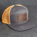 Leather Patch Flat Bill 7 Panel Trucker Hat - Pine Trees Stamp