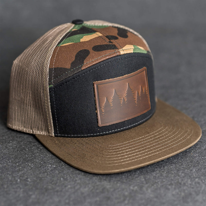Leather Patch Flat Bill 7 Panel Trucker Hat - Pine Trees Stamp
