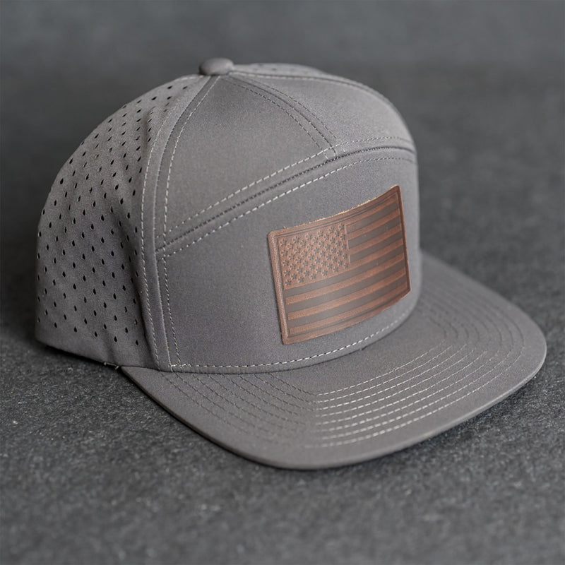 Leather Patch Flat Bill 7 Panel Perforated Performance Hat - American Flag Stamp