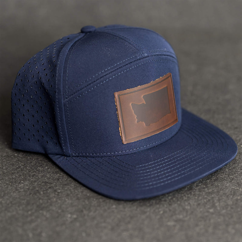 Leather Patch Flat Bill 7 Panel Perforated Performance Hat - Washington Stamp