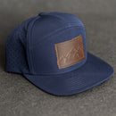 Leather Patch Flat Bill 7 Panel Perforated Performance Hat - Mountains Stamp