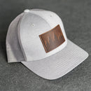 Leather Patch Performance Style Trucker Hat - Pine Tree Ridgeline Stamp