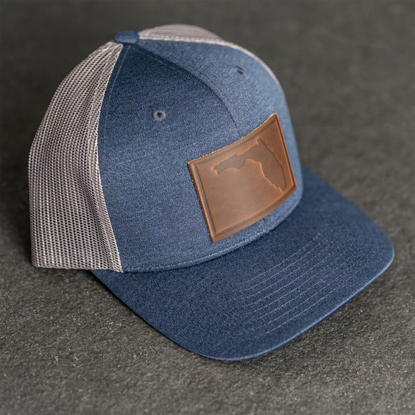 Leather Patch Performance Style Trucker Hat - Florida Stamp