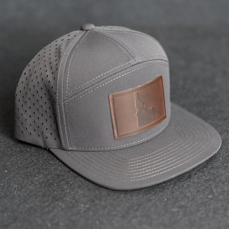 Leather Patch Flat Bill 7 Panel Perforated Performance Hat - Idaho Stamp