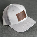 Leather Patch Performance Style Trucker Hat - New York Stamp