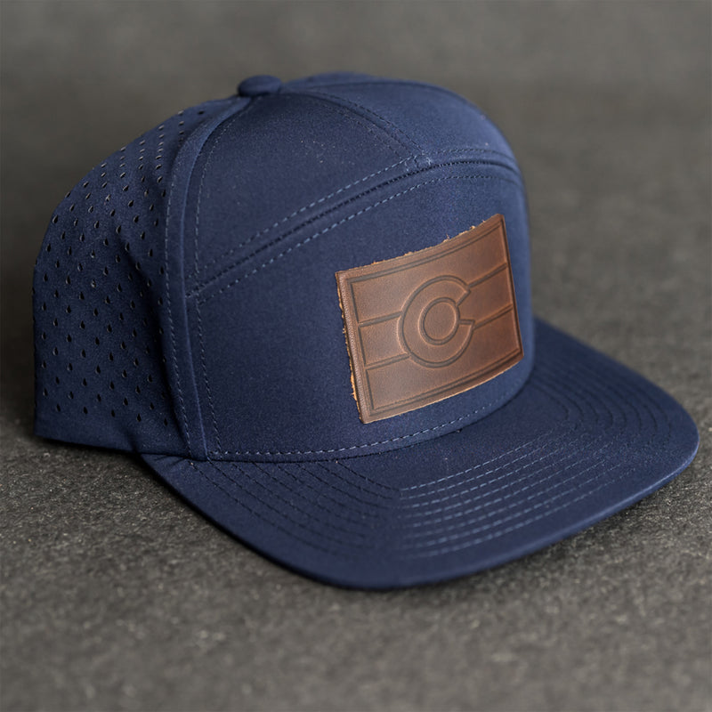 Leather Patch Flat Bill 7 Panel Perforated Performance Hat - Colorado Flag Stamp