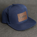 Leather Patch Flat Bill 7 Panel Perforated Performance Hat - Fish Stamp