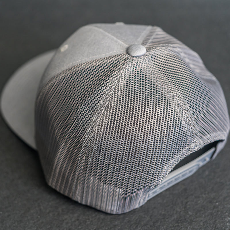Leather Patch Performance Style Trucker Hat - Deer Stamp
