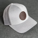 Leather Patch Performance Style Trucker Hat - PNW Stamp