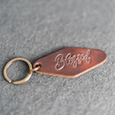 Leather Motel Key Shape Keychain with a Blessed Stamp Design