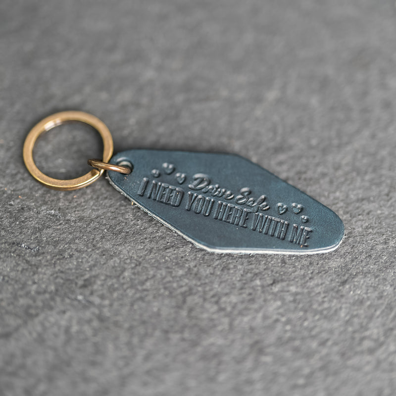 Leather Motel Key Shape Keychain with a Drive Safe Stamp Design