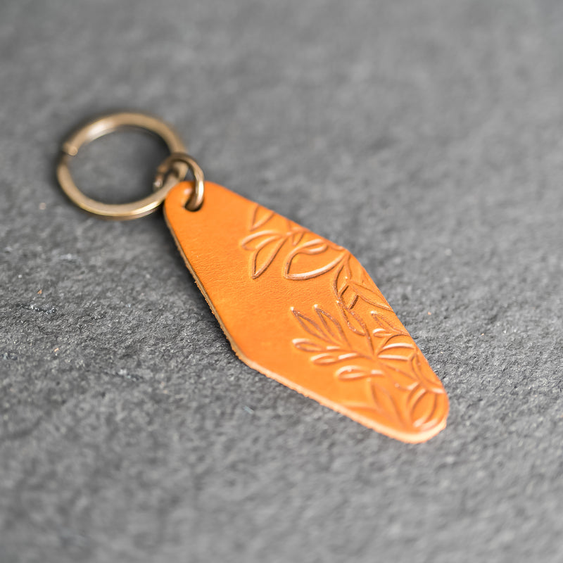 Leather Motel Key Shape Keychain with Floral Stamp Design