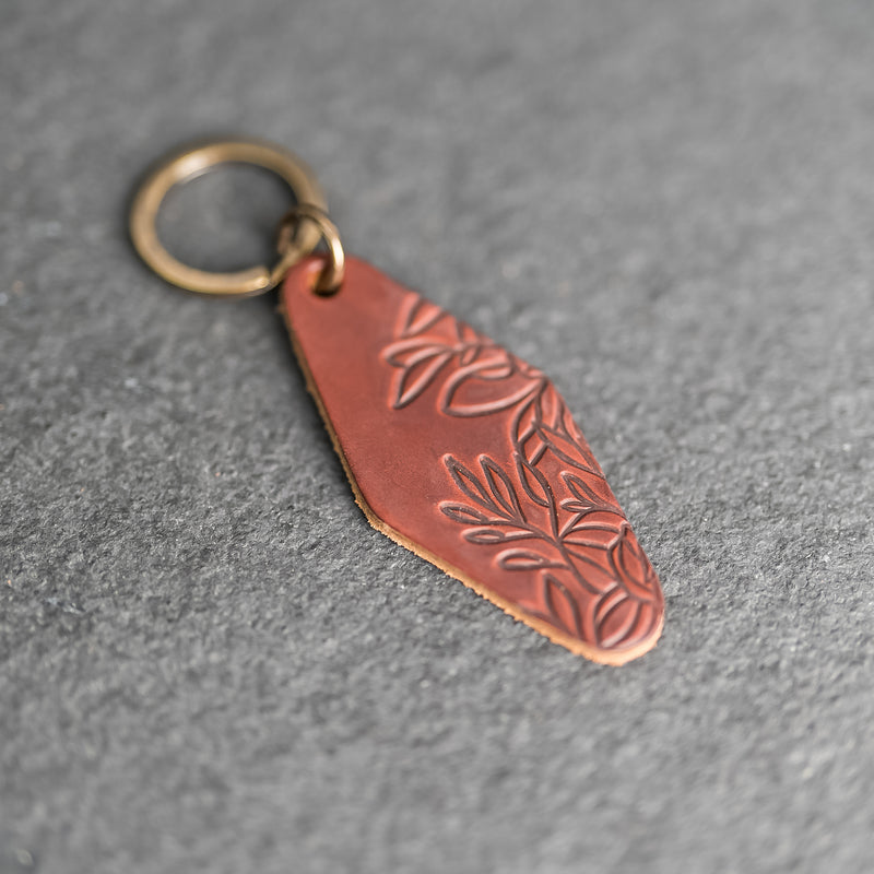 Leather Motel Key Shape Keychain with Floral Stamp Design