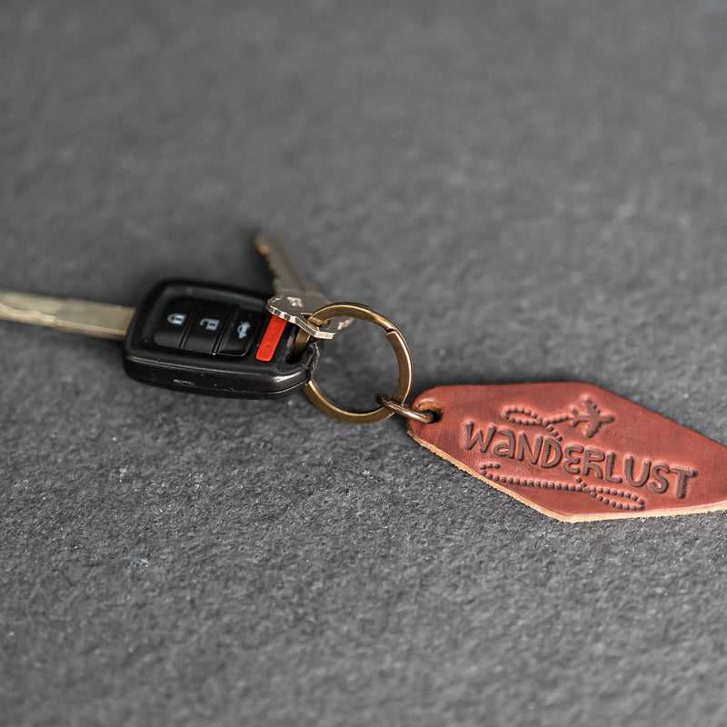 Leather Motel Key Shape Keychain with Wanderlust Stamp Design