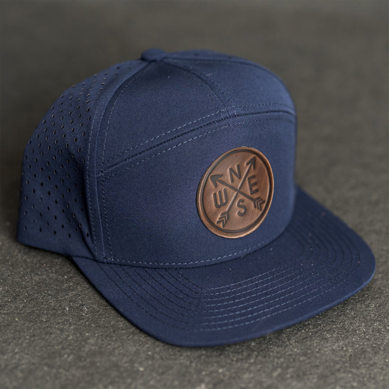 Leather Patch Flat Bill 7 Panel Perforated Performance Hat - Compass Rose Stamp