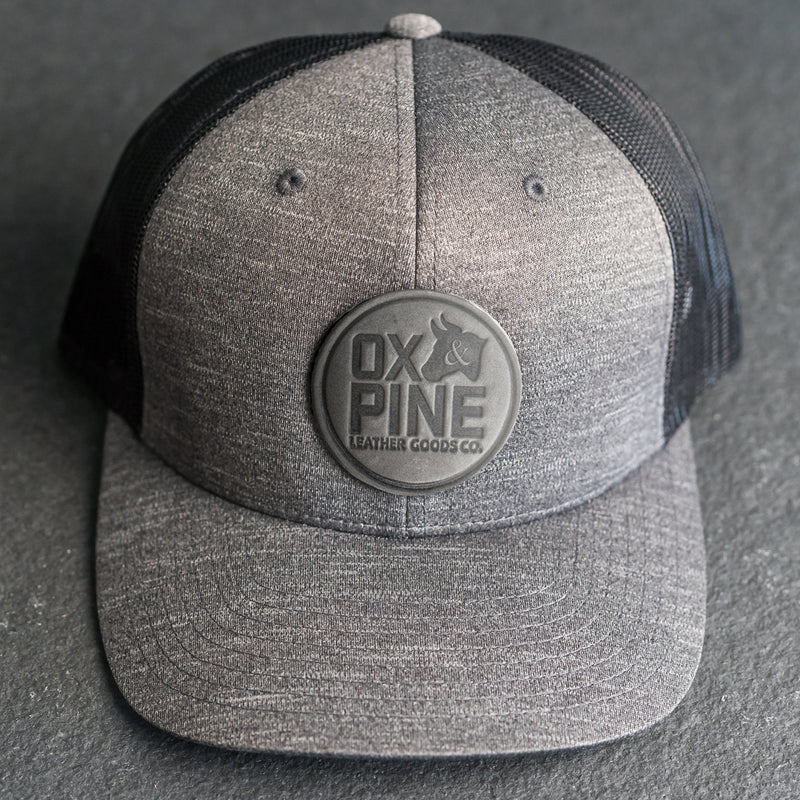 Leather Patch Performance Style Trucker Hat - Ox & Pine Stamp - Circle