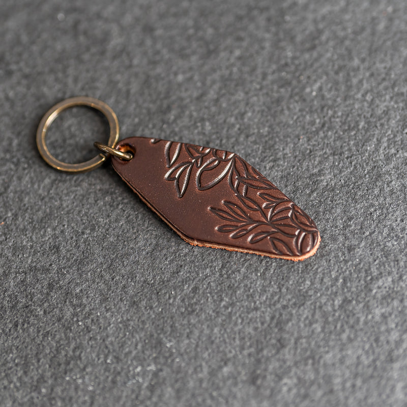 Leather Motel Key Shape Keychain with Floral Stamp Design