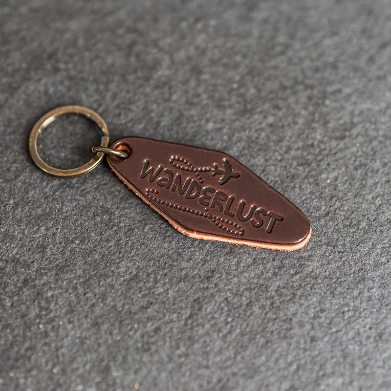 Leather Motel Key Shape Keychain with Wanderlust Stamp Design