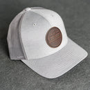 Your Logo on a Leather Patch Performance Style Trucker Hat - Circle Patch