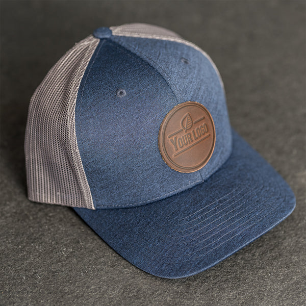 Your Logo on a Leather Patch Performance Style Trucker Hat - Circle Patch