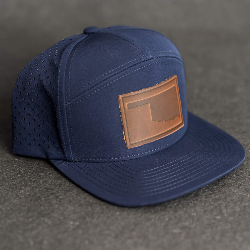 Leather Patch Flat Bill 7 Panel Perforated Performance Hat - Oklahoma Stamp