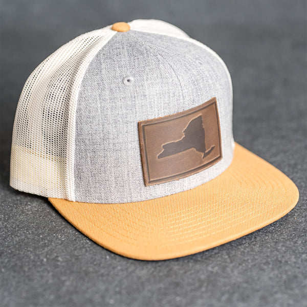 Leather Patch Flat Bill Trucker Hat - New York Stamp
