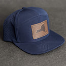 Leather Patch Flat Bill 7 Panel Perforated Performance Hat - New York Stamp