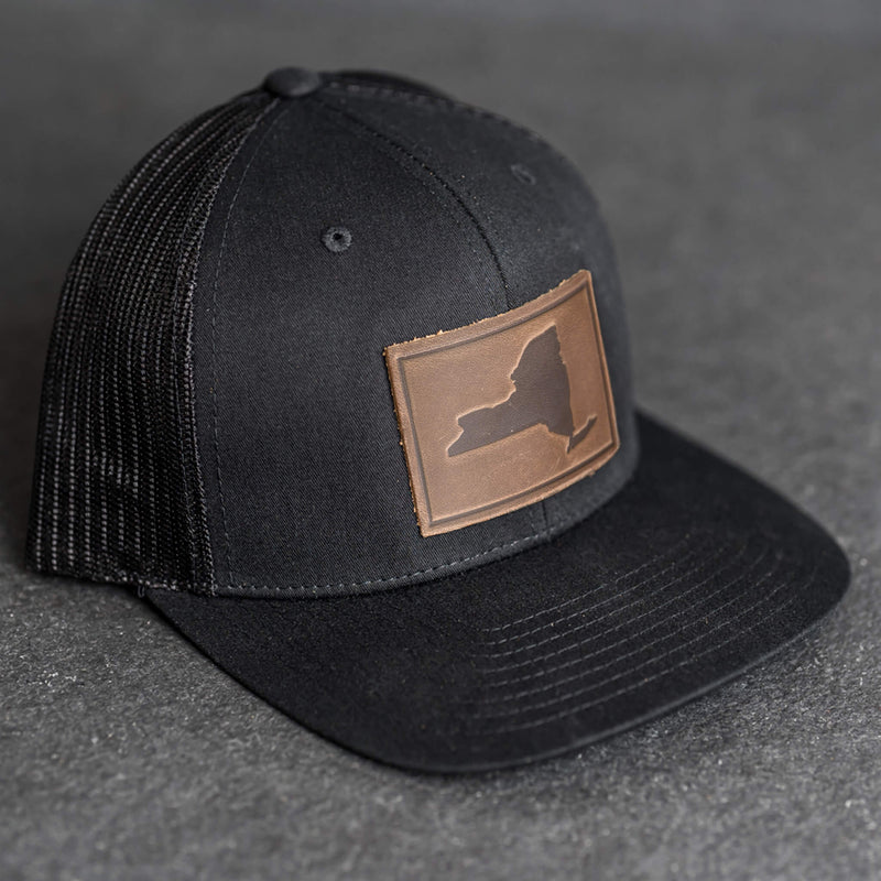 Leather Patch Trucker Style Hat - New York Stamp