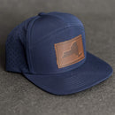 Leather Patch Flat Bill 7 Panel Perforated Performance Hat - New York Stamp