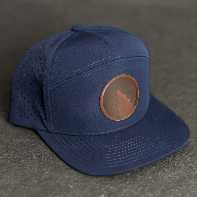 Leather Patch Flat Bill 7 Panel Perforated Performance Hat - Wolf Stamp