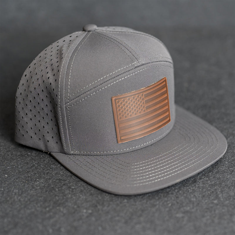 Leather Patch Flat Bill 7 Panel Perforated Performance Hat - American Flag Stamp