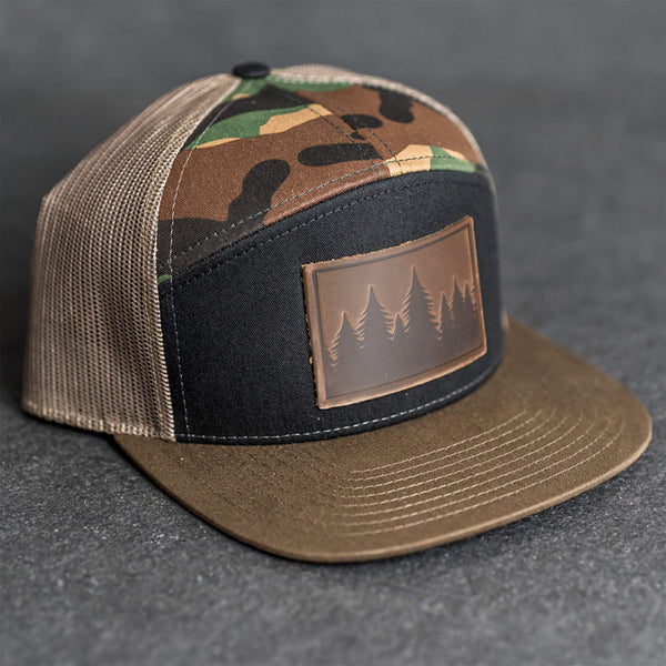 Leather Patch Flat Bill 7 Panel Trucker Hat - Pine Trees Stamp