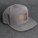 Leather Patch Flat Bill 7 Panel Perforated Performance Hat - Pine Trees Stamp