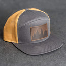 Leather Patch Flat Bill 7 Panel Trucker Hat - Pine Trees Stamp