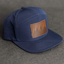 Leather Patch Flat Bill 7 Panel Perforated Performance Hat - Pine Trees Stamp