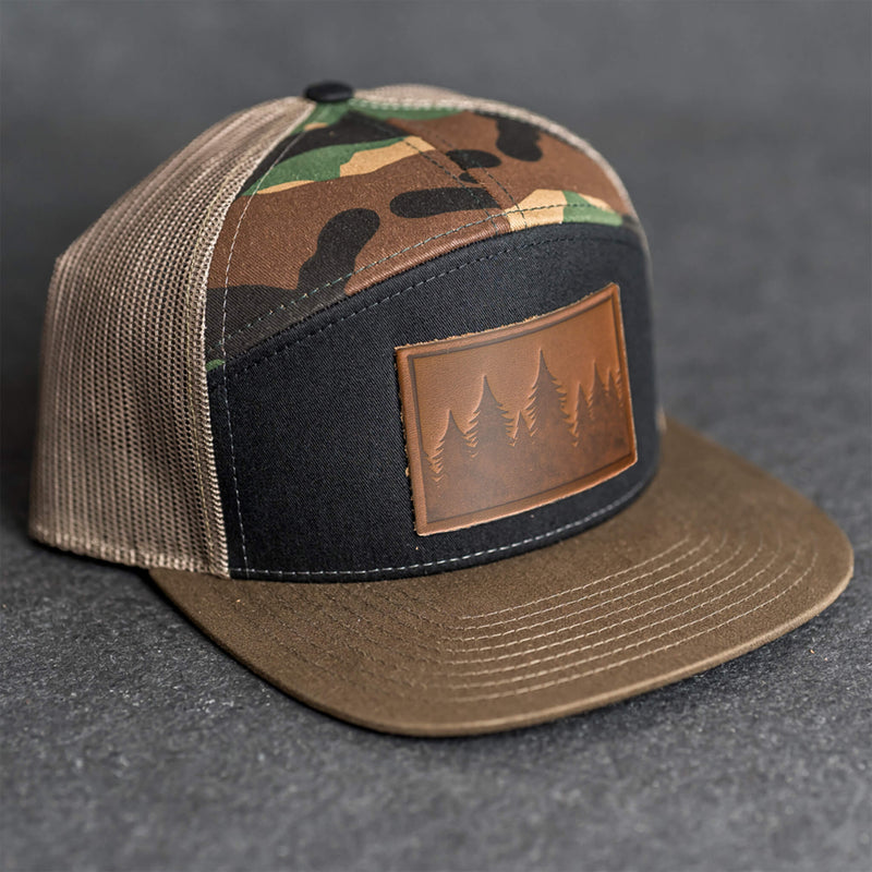 Leather Patch Flat Bill 7 Panel Trucker Hat - Pine Trees Stamp