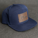 Leather Patch Flat Bill 7 Panel Perforated Performance Hat - Mom Cursive Stamp