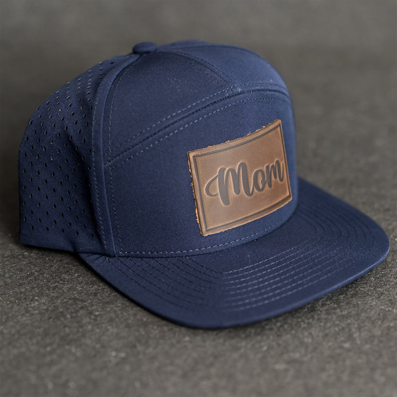 Leather Patch Flat Bill 7 Panel Perforated Performance Hat - Mom Cursive Stamp
