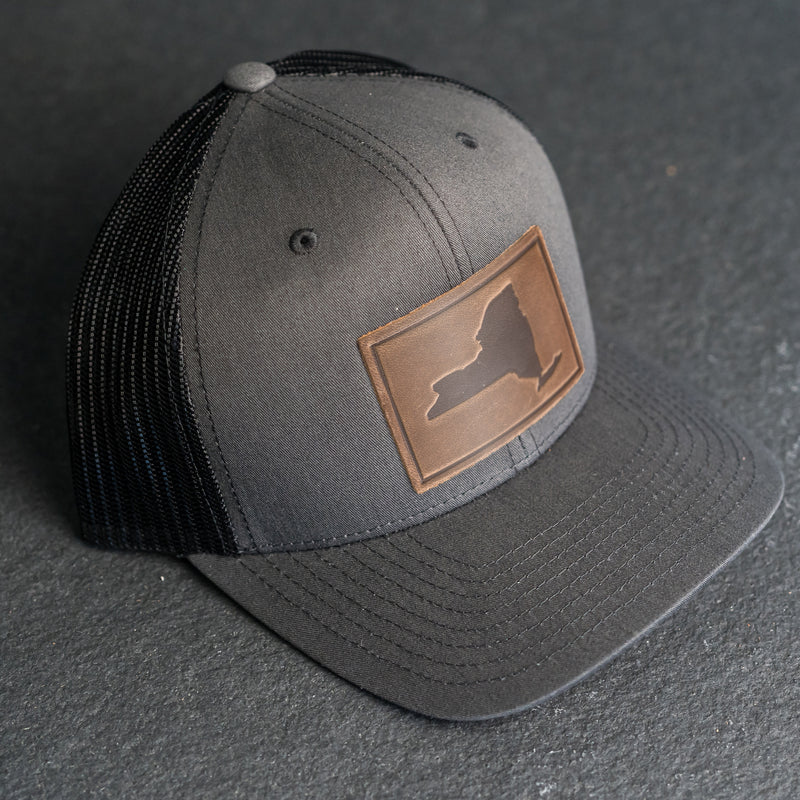 Leather Patch Trucker Style Hat - New York Stamp