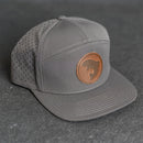 Leather Patch Flat Bill 7 Panel Perforated Performance Hat - Circle Patch - Fish Stamp