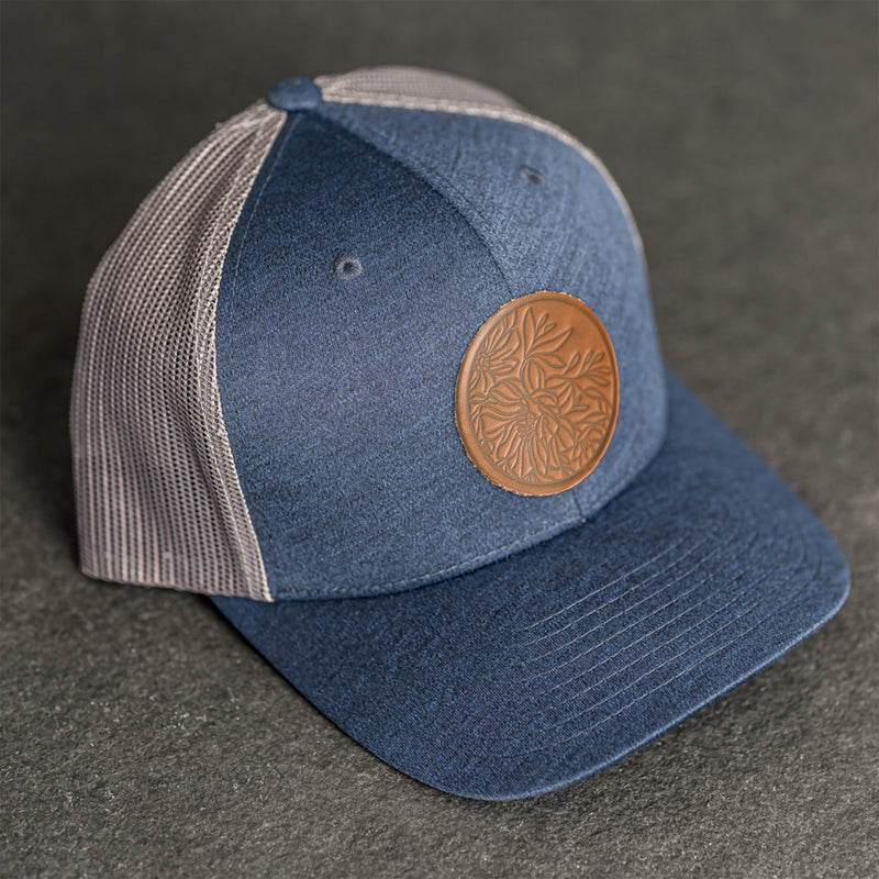 Leather Patch Performance Style Trucker Hat - Circle Patch - Floral Stamp