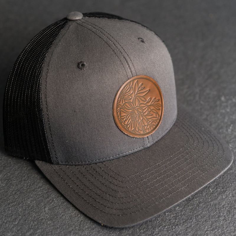 Leather Patch Trucker Style Hat - Circle Patch - Floral Stamp