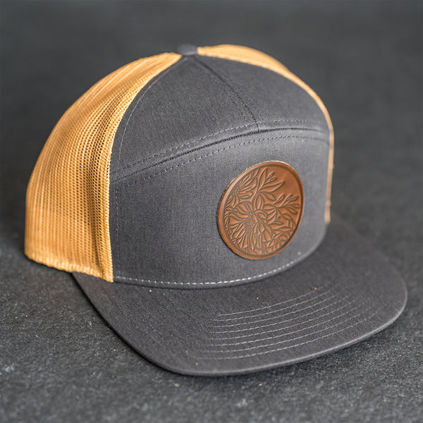 Leather Patch Flat Bill 7 Panel Trucker Hat - Circle Patch - Floral Stamp
